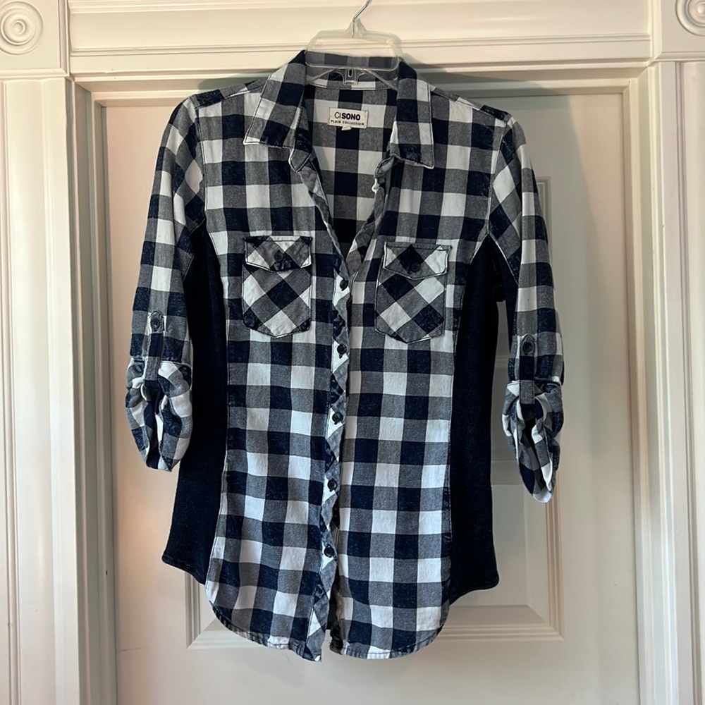 Cisono plaid collection, with form fitting sides and sleeve detailing.